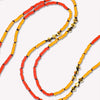 Gold Malibu Short Necklace hand-knotted on a black silk cord. Detailed view of necklace in Vivid Mango. Made to order in 14 to 17 inch lengths.